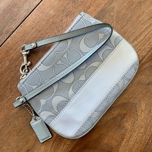 Coach | Light gray wristlet.